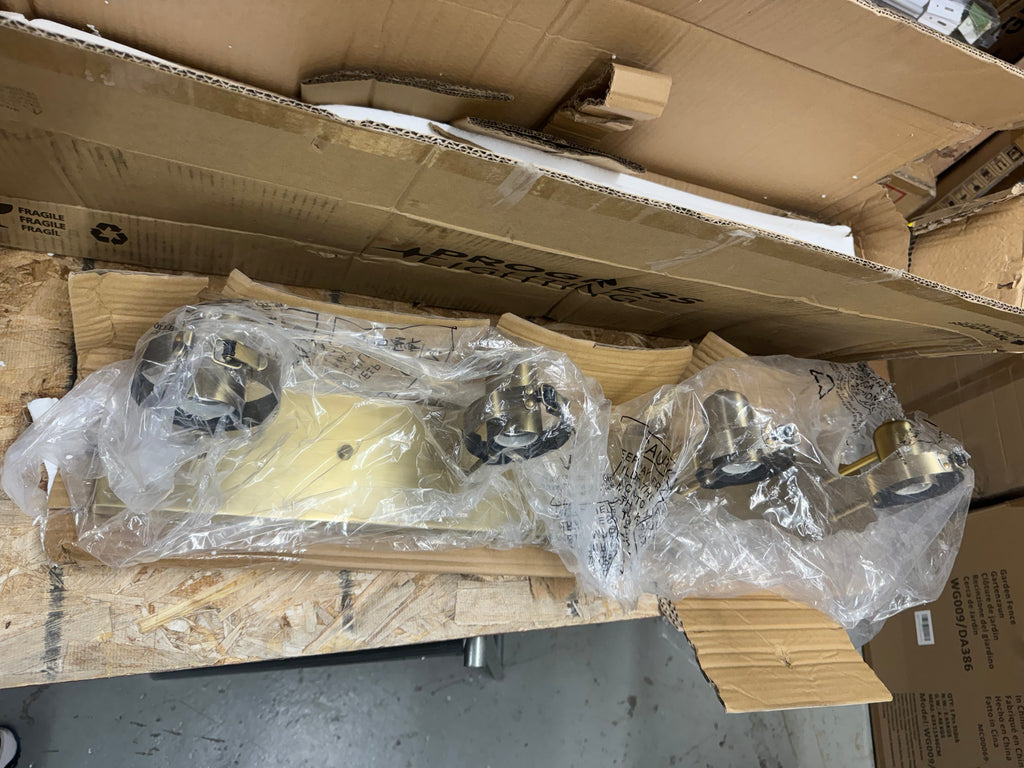 Progress Lighting Calhoun Vanity Light 4 Light Gold Vintage Brass With Clear Glass For Modern Farmhouse Bathrooms