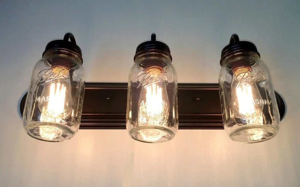 Mason Jar Vanity Light For Farmhouse Bathrooms Three Jar Shades Warm Ambience And Modern Glow