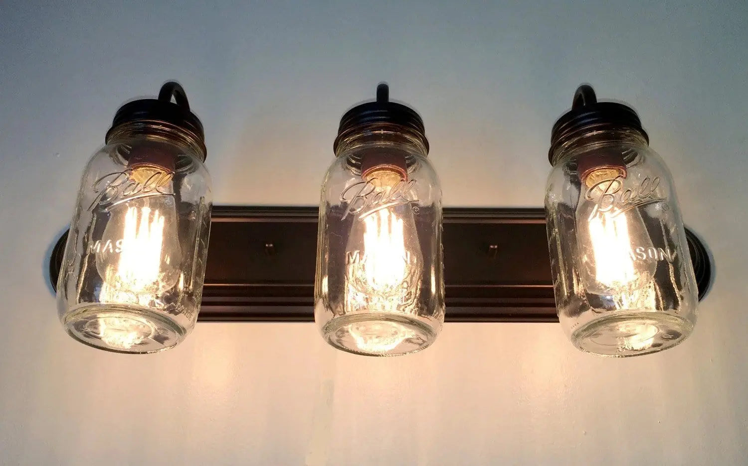 Mason Jar Vanity Light For Farmhouse Bathrooms Three Jar Shades Warm Ambience And Modern Glow