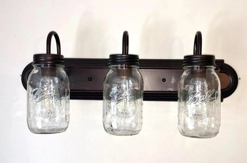 Mason Jar Vanity Light For Farmhouse Bathrooms Three Jar Shades Warm Ambience And Modern Glow